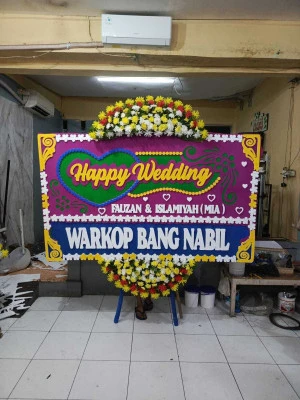 Papan Bunga di Kamal Muara