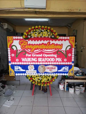 Papan Bunga di Kamal Muara